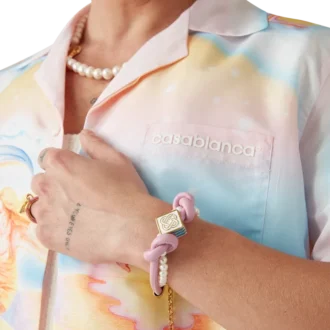 Bracciale con perle annodate rosa Bracciale con perle annodate rosa