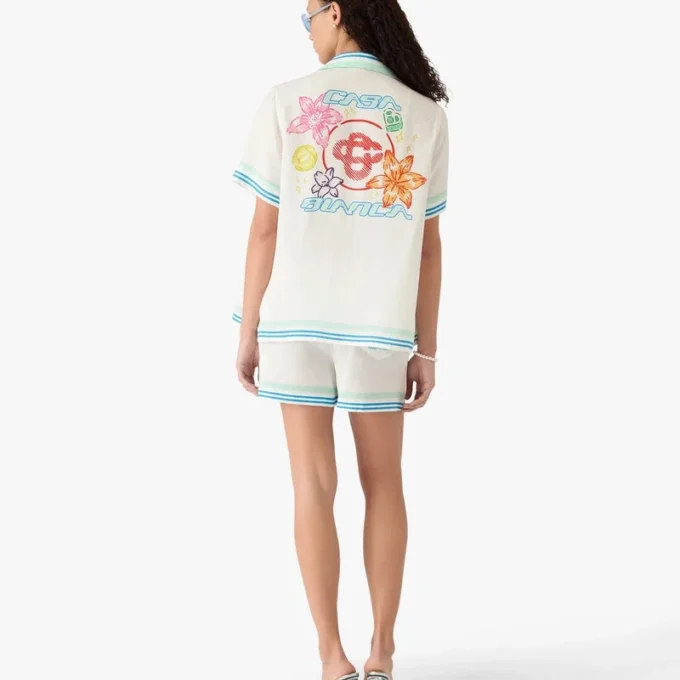 Camicia in seta a pantaloncini con colletto cubano floreale Camicia in seta a pantaloncini con colletto cubano floreale