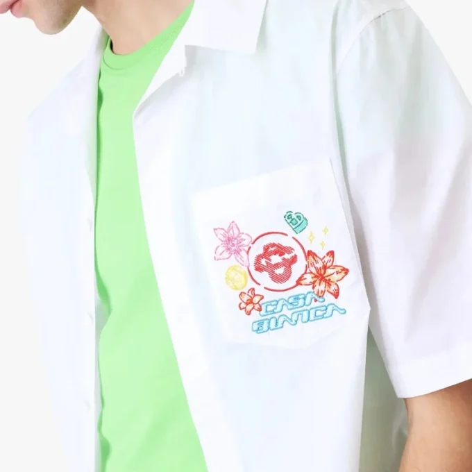 Camicie a maniche corte ricamate Collage D’icones Graphiques