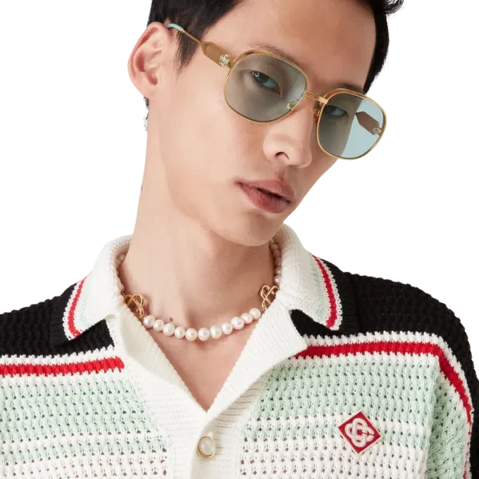 Giacca-pantalone in cotone all’uncinetto