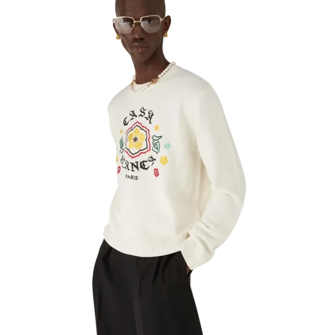 Maglia a collo rotondo in lana merino con emblema