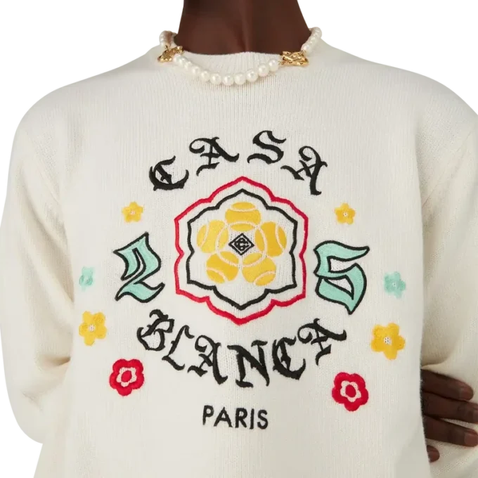 Maglia a collo rotondo in lana merino con emblema