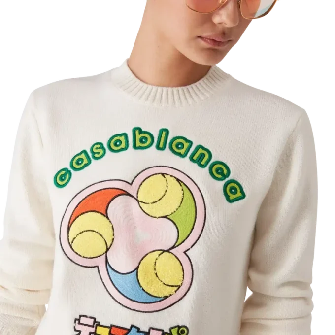 Maglia in lana merino con motivo a palline da tennis e collo rotondo