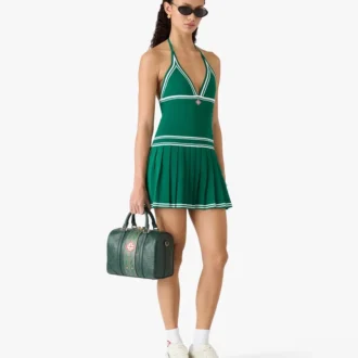 Miniabito verde plissettato con scollo all’americana