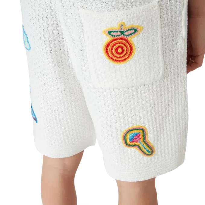 Pantaloncini con motivi all’uncinetto