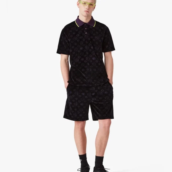 Pantaloncini in velluto con monogramma viola