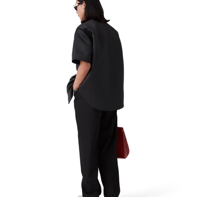 Pantaloni chino a pieghe