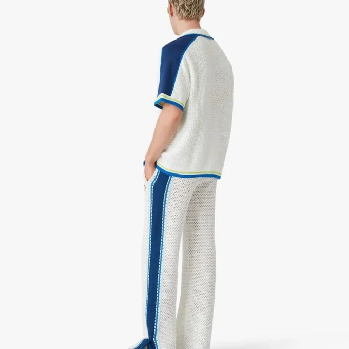 Pantaloni da ginnastica in rete a righe bianche e blu