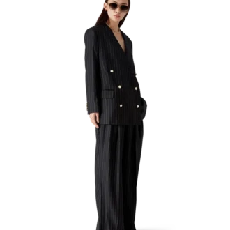 Pantaloni sartoriali in lana gessata a tripla piega