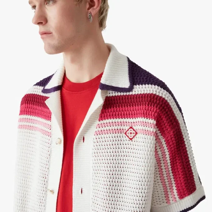 Polo a maniche corte a righe bianche in pantaloncini