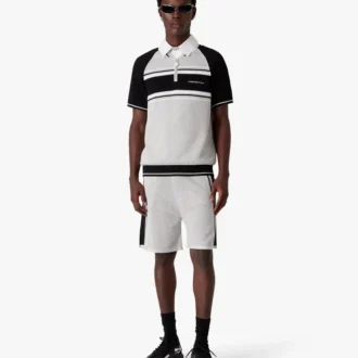 Polo a pantaloncini con zip e strisce in rete metallica