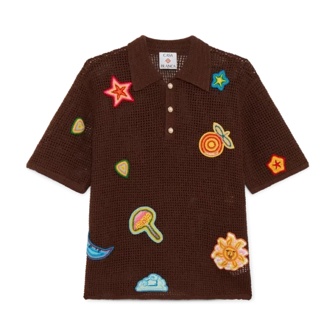 Polo con motivi all’uncinetto