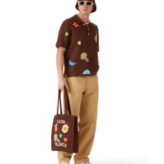 Polo con motivi all’uncinetto