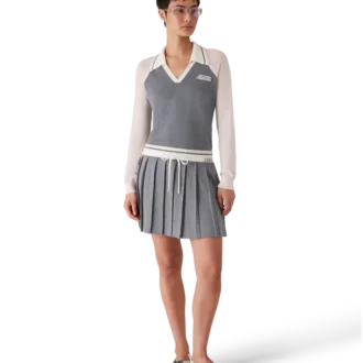 Polo da tennis in lana merino a maniche lunghe