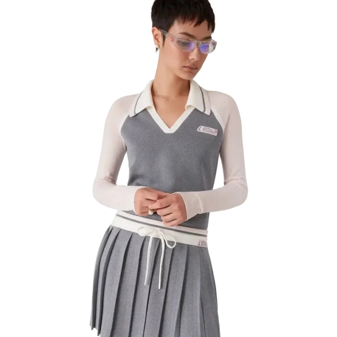 Polo da tennis in lana merino a maniche lunghe