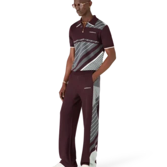 Polo da tennis in lana merino a righe diagonali