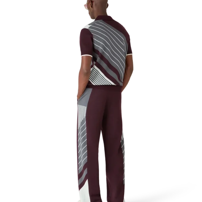 Polo da tennis in lana merino a righe diagonali