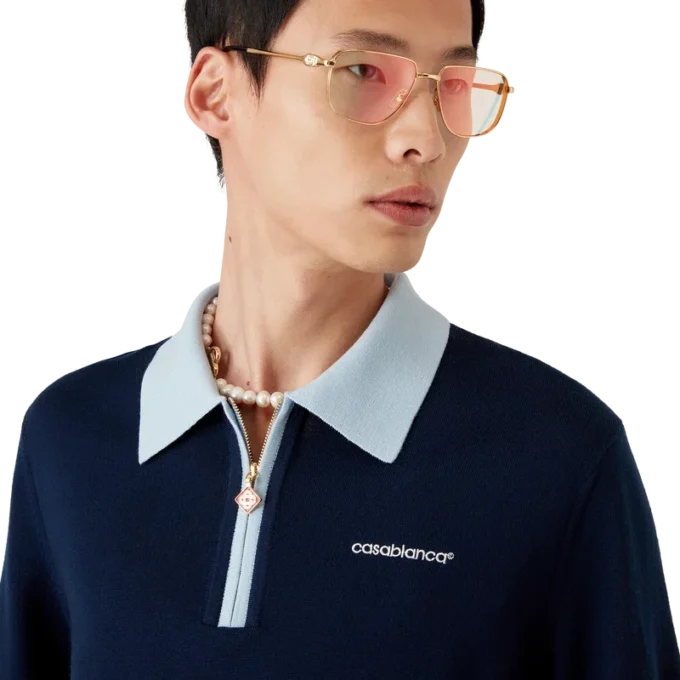 Polo da tennis in maglia merino