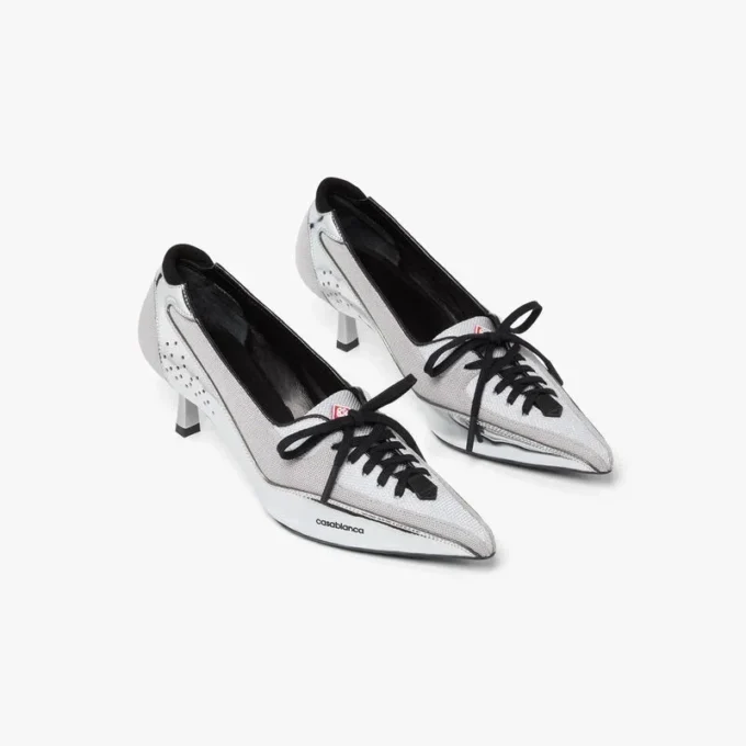 Sneaker con tacco in pelle argentata Sneaker con tacco in pelle argentata