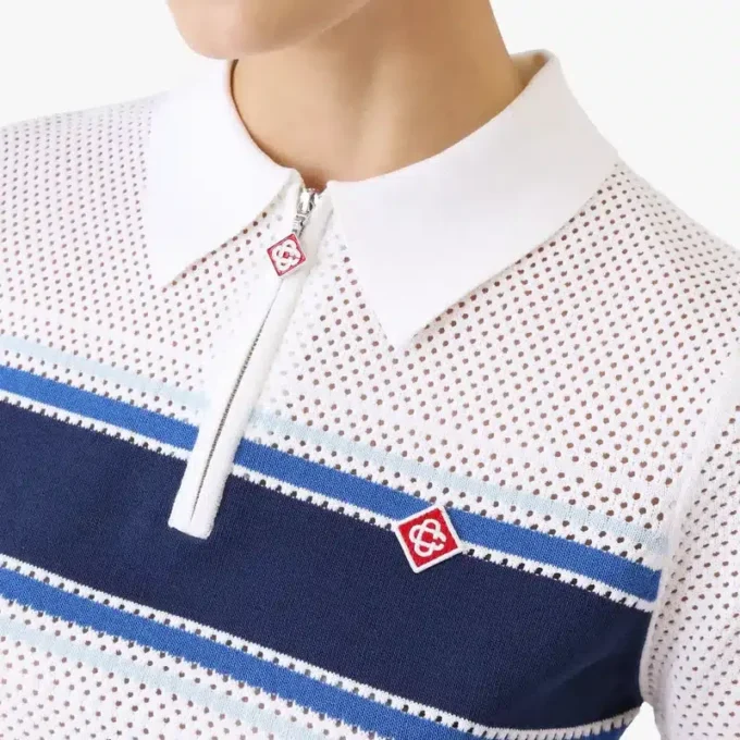 Top in maglia a righe bianche e blu